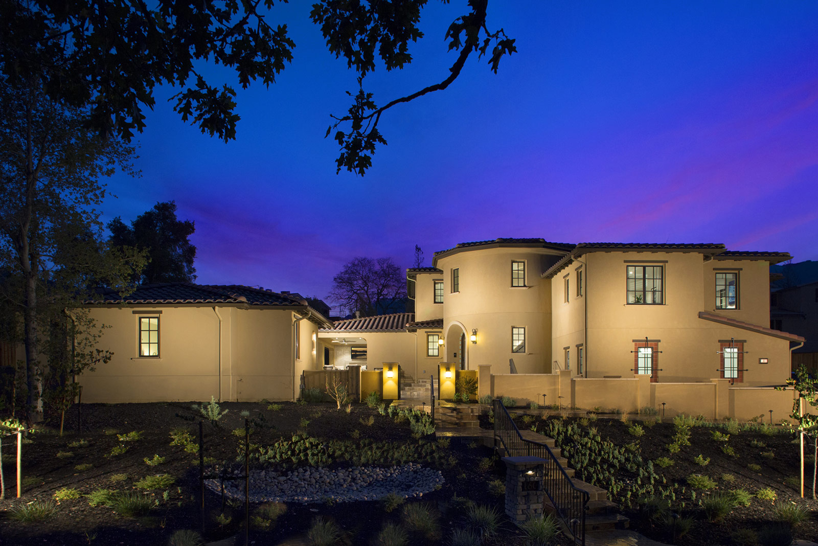 Unique, modern townhomes by SummerHill Homes featuring vibrant exterior colors, distinctive architecture, and inviting entrances.